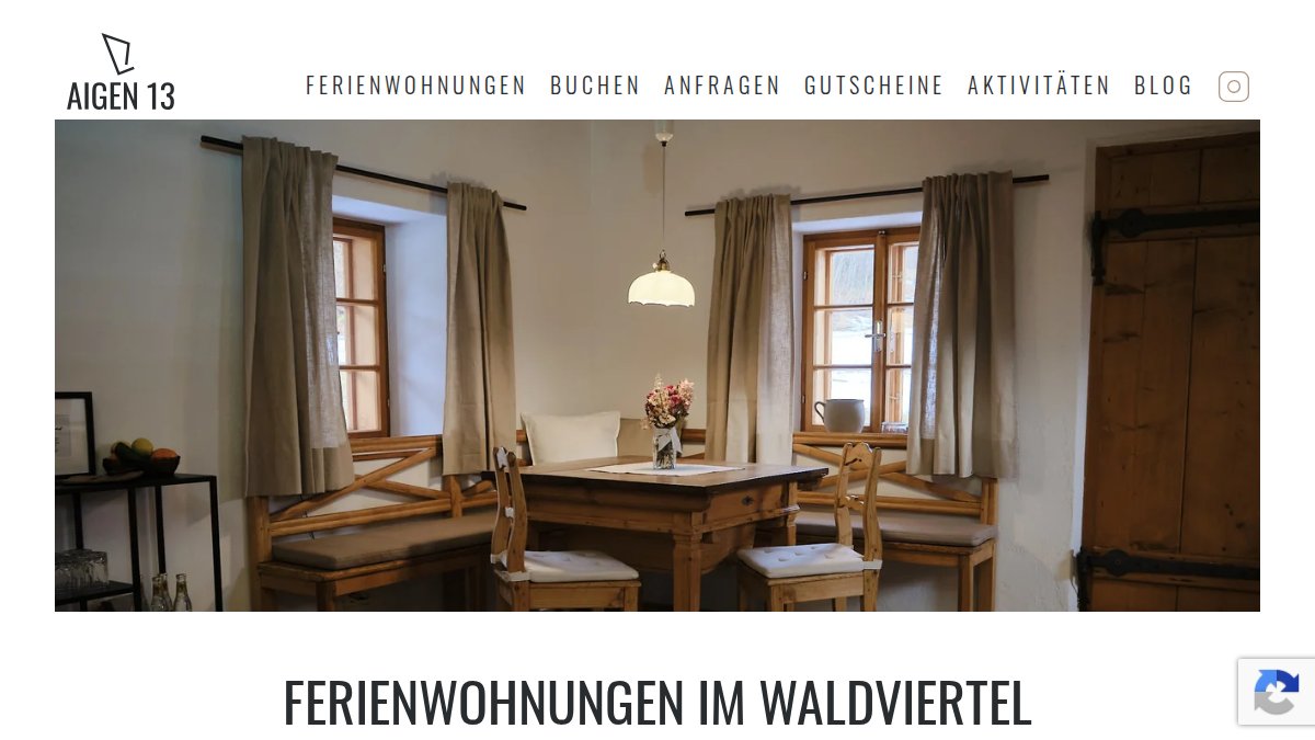 Screenshot of Ferienwohnungen page on aigen13.at